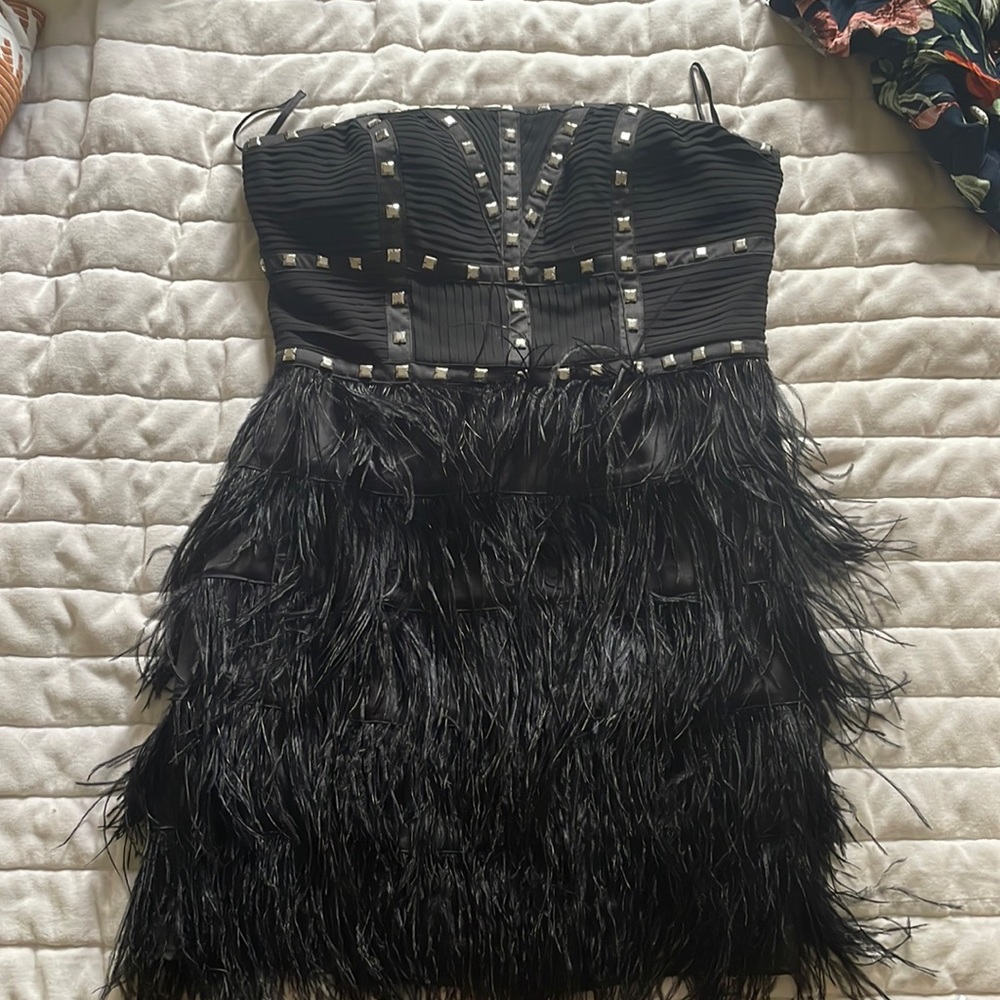 Strapless black mini dress, fun and full of feathers!